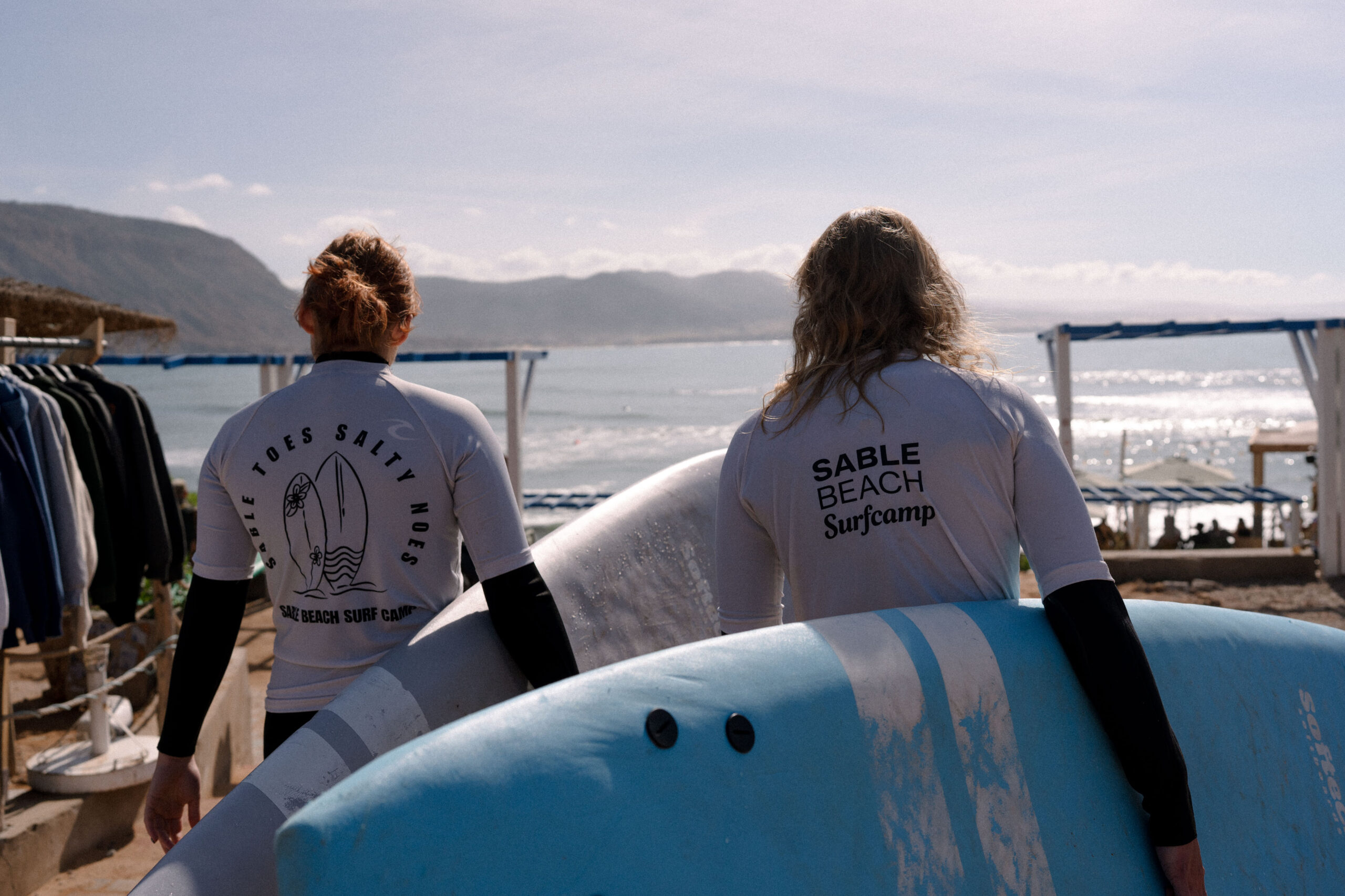 Guests enjoying free surf session in Taghazout